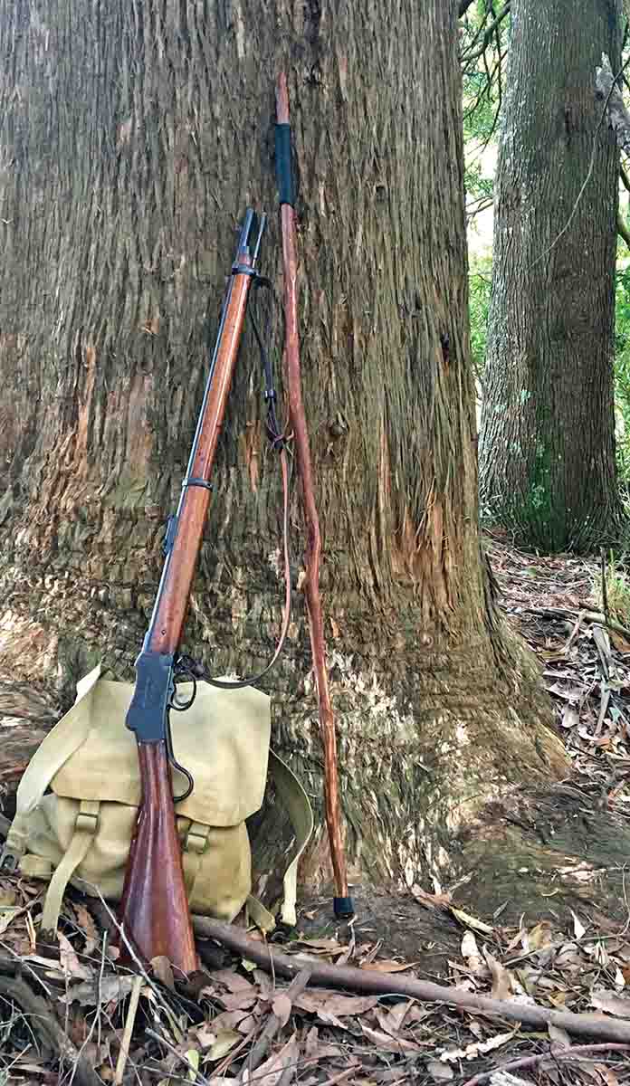 The author’s manuka “ghillie stick” shown with a favorite .577-450 Martini rifle and hunting knapsack